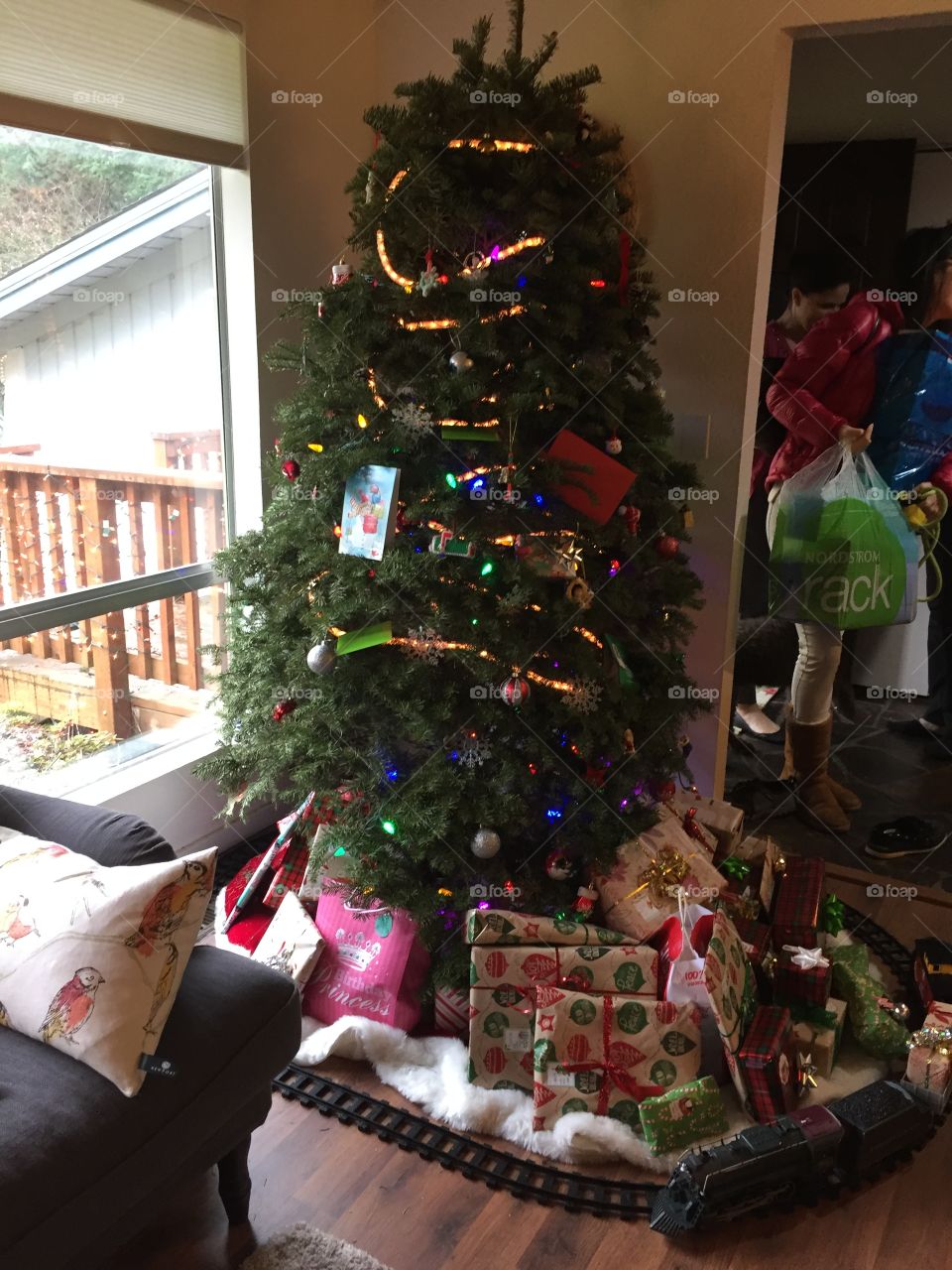 Christmas, Christmas tree, gifts, presents, boxes, train, train track, ribbons, gift wrap, wrapper, holiday, under the tree, decorations, festive, festival, party, Christmas morning, December, Santa