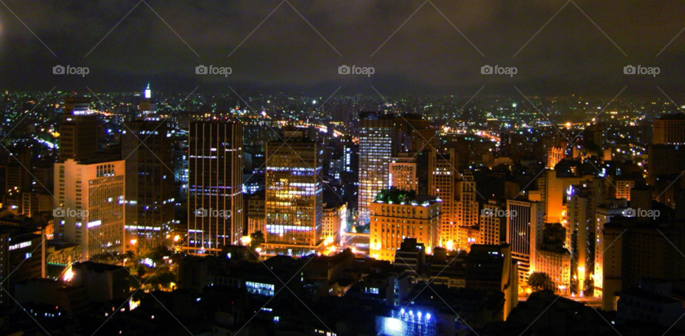 sky city night skyline by riksen