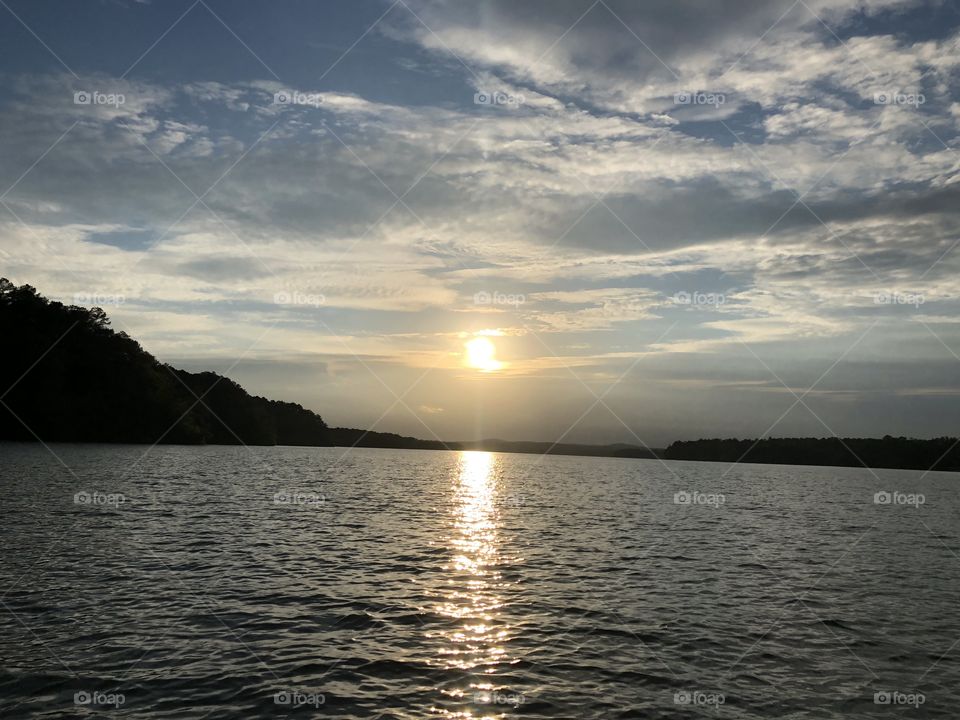 Bright sunset peaceful waters on lake Wedowee