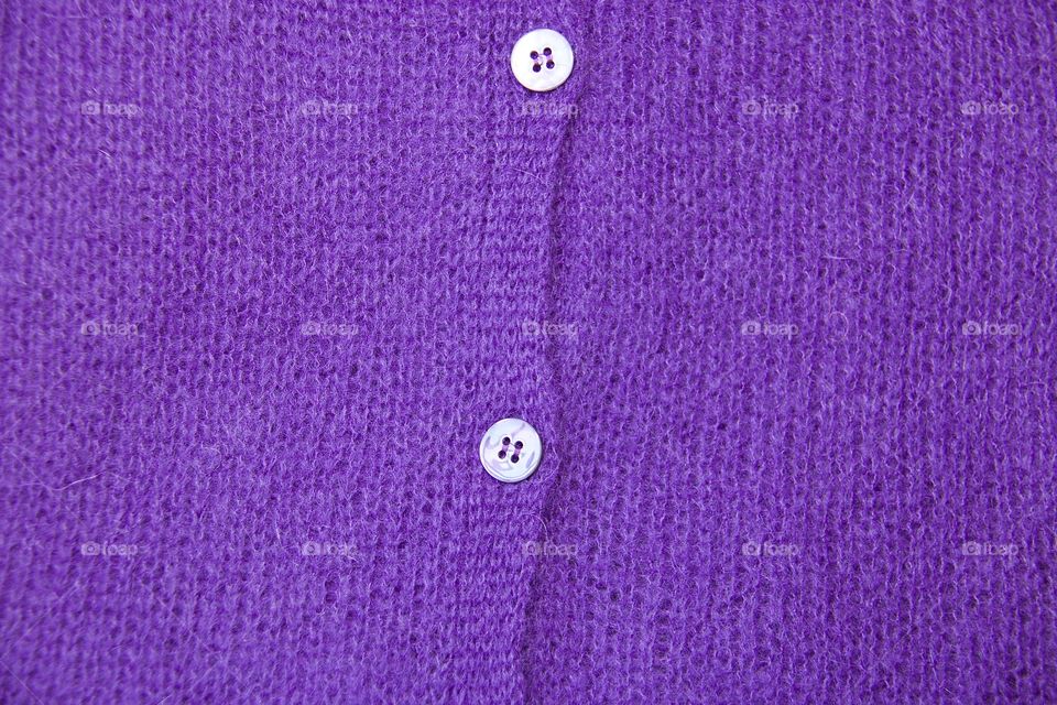 Close-up of a purple cardigan