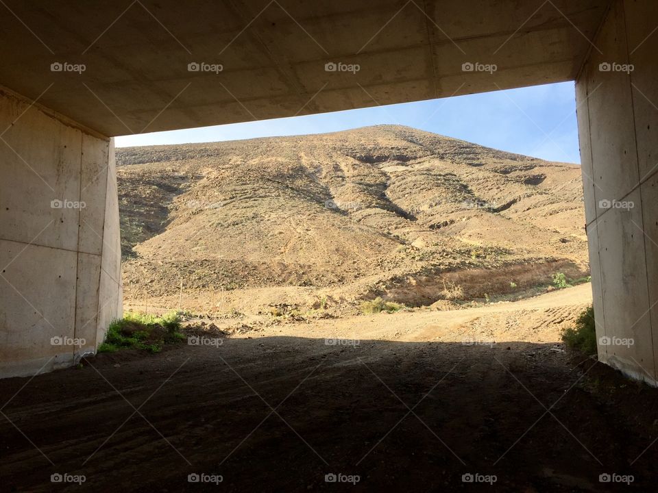 Mountain view through a tunnel