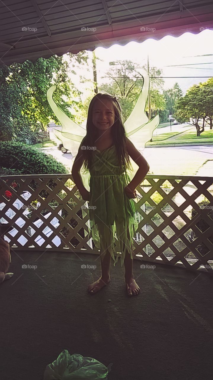 A green moment in time in the most beautiful place on Earth. I thought she looked like a brunette Tinkerbell, and couldn't pass up the opportunity to catch it.