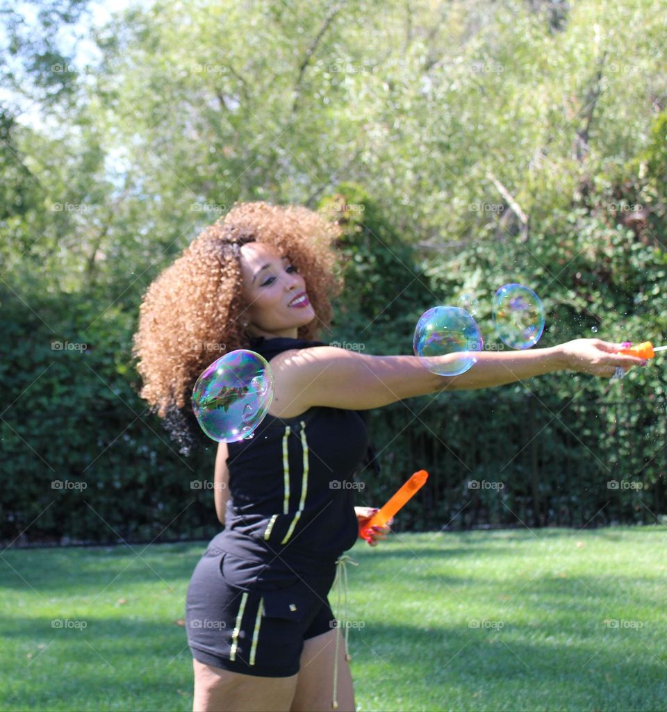 Being happy and enjoying the simple things in life, bubble 🫧  play at a park.