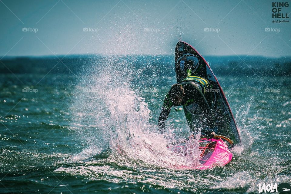 Windsurfer freestyle trick jump