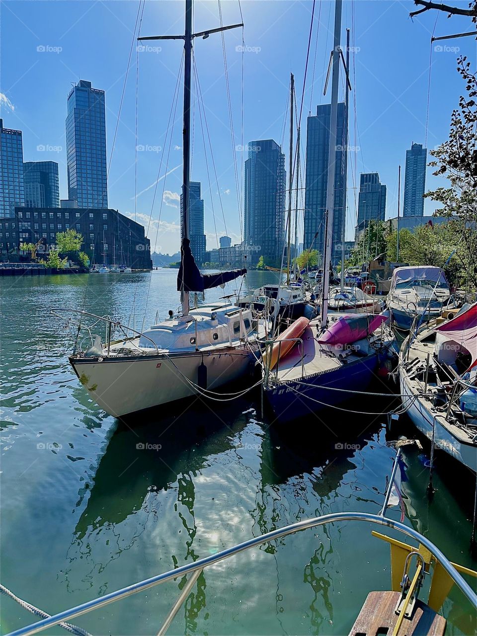“Newtown Creek” by the “Pulaski Bridge” in LIC, Queens with its many boats is quite beautiful and the best views are from one of them such as the “28 foot 1969 Luhrs” cabin cruiser “Salvation“. 2024. Hypnotic Productions