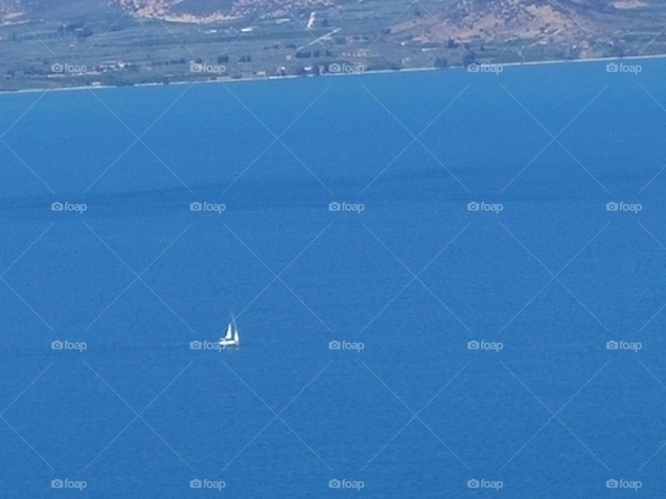 yacht entering Nafplion bay, Peloponnese Greece