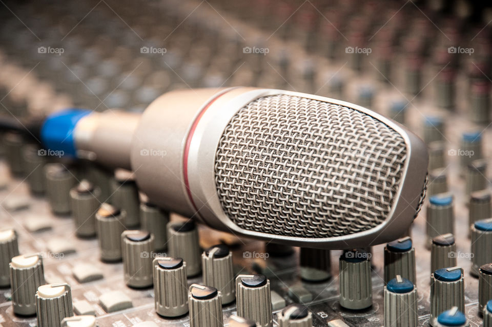 Microphone on audio mixing console
