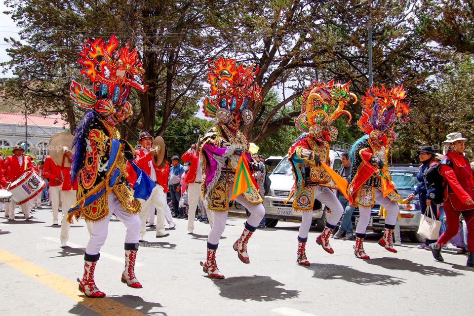 People are dancing on the streets of Oruro