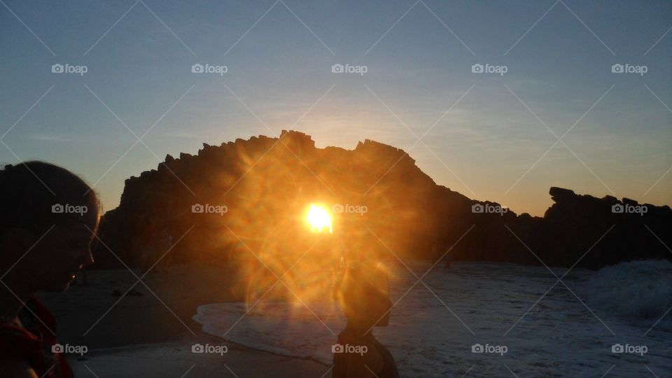 Sunset in a hole stone 