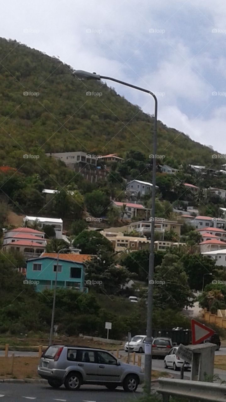 beautiful st. maarten, st. martin hillside with colorful home and rooftops making the photo one of kind and genuine to the country's landscape