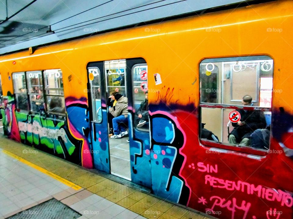 a Subway train with Urban art