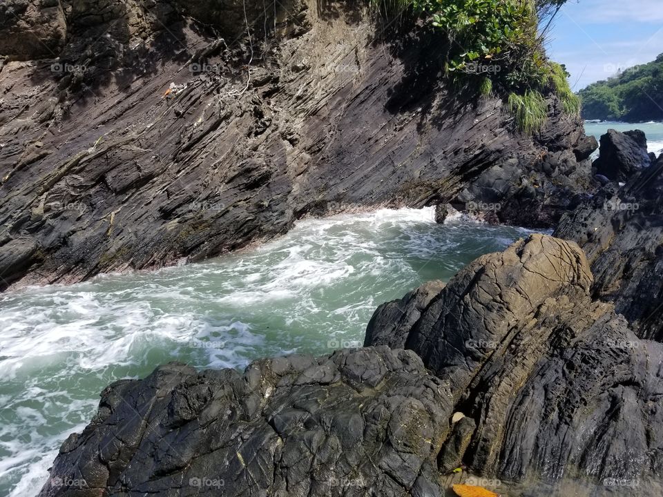 The peaceful waters flow through the stoic rock with the tide in hosanna resort. Poetry in action exists here in Trinidad and Tobago. This place inspires peace, serenity and the want to create art in its various forms.