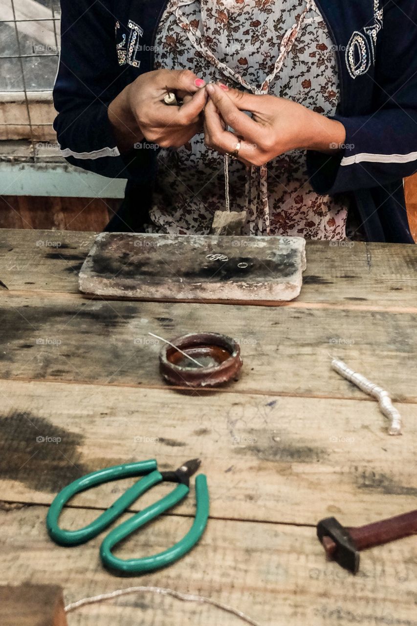 Woman making Jewelry