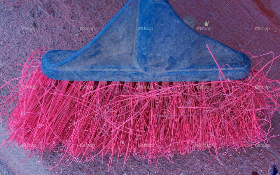 A dirty pink broom as seen on the street in San Miguel de Allende, Mexico
