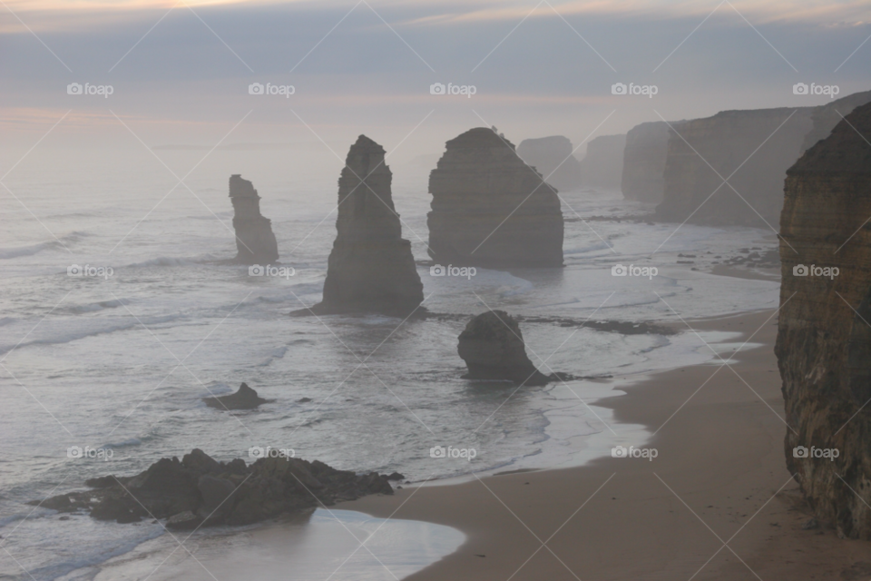 beach ocean rocks misty by kshapley