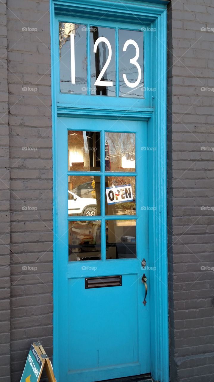 Pretty blue door on local business in the local art district