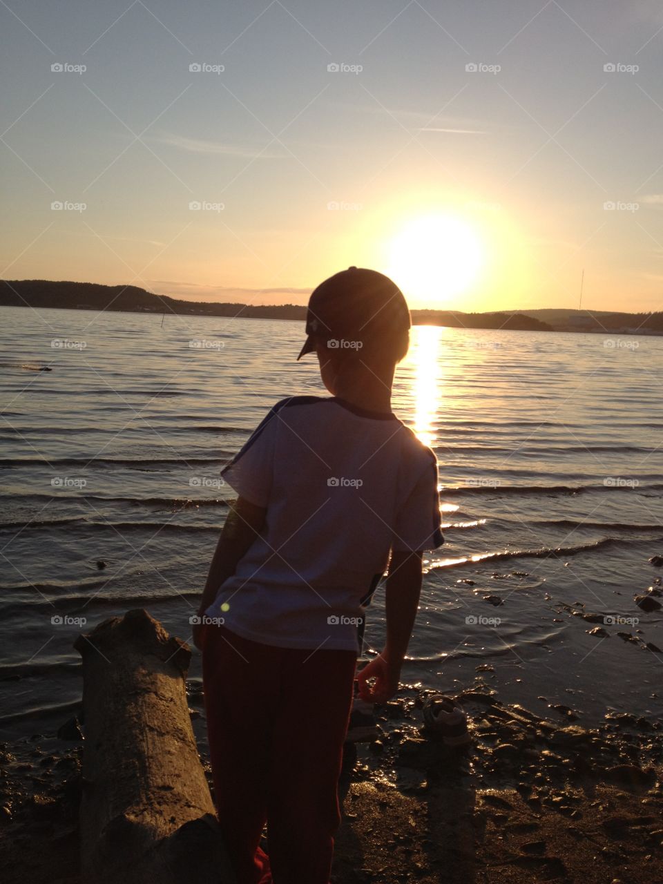 Boy at beach in sunset . Playing with my son at beach