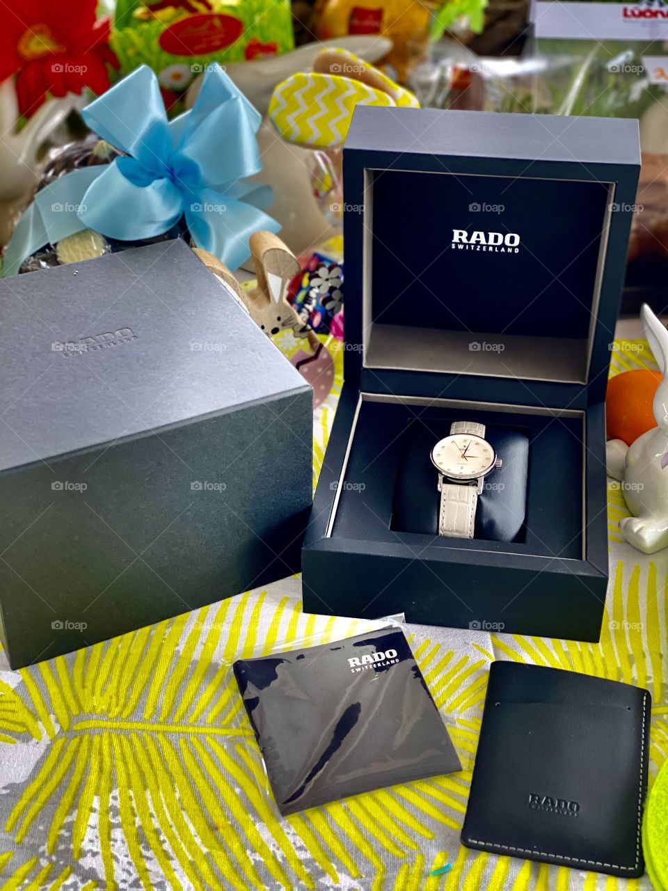 glad clock, glad clock as a gift for Easter, holiday gift Swiss clock glad, festive table, Easter, decorations on the table, joy, holiday, eggs, gifts