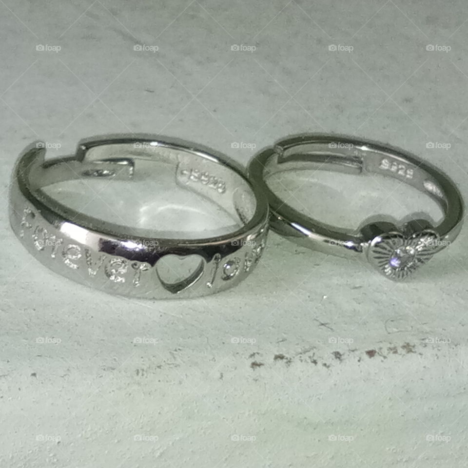 A paired ring with engage two fingers with loads of love....