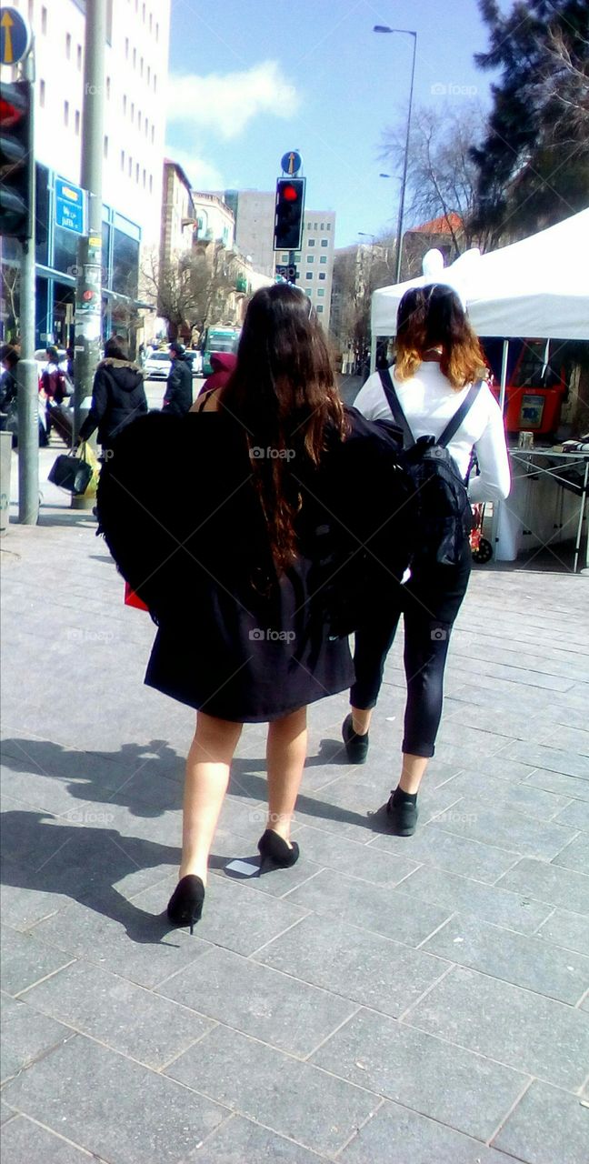 Two young women in festival dress