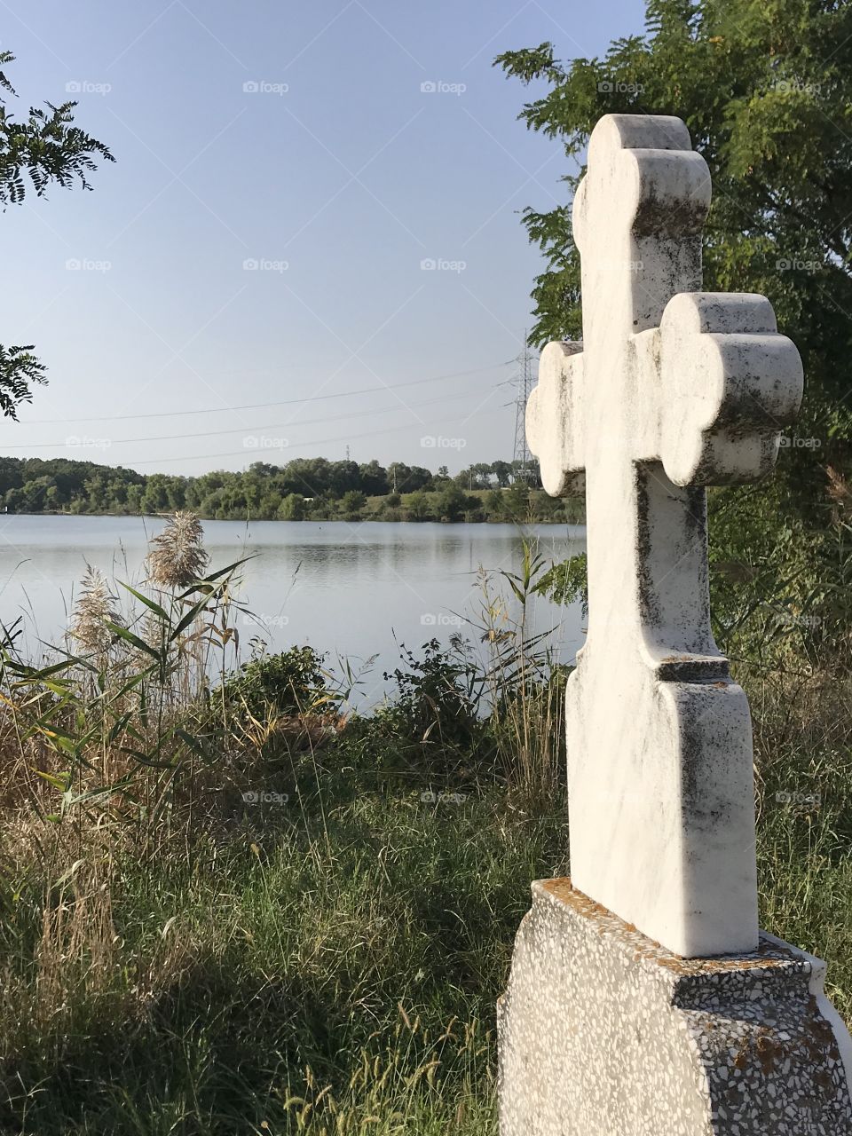 Orthodox cross and quite lake, Cenica, Romania