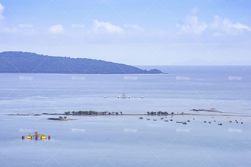 Fishing boats parked on the sea at Laem thian beach in Chumphon ,Thailand.