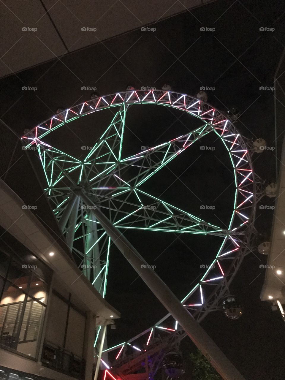 View of the Melbourne Star in night time with the light on