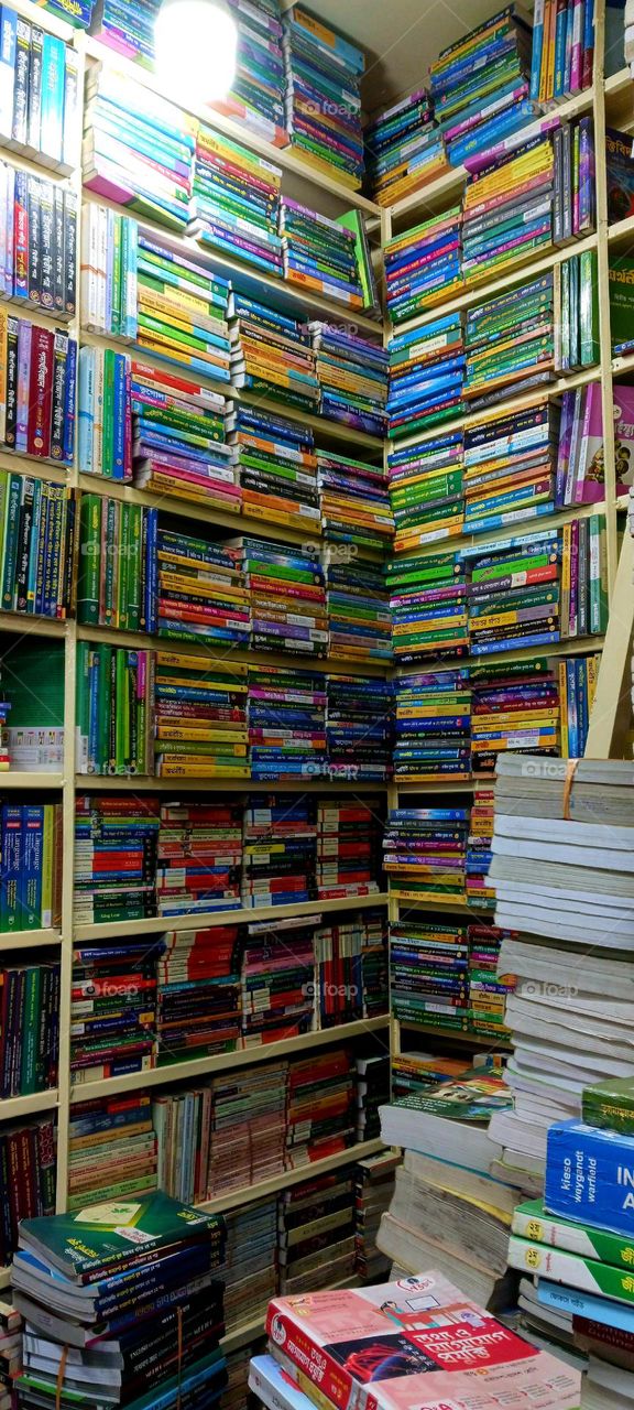 Secondhand bookstall at Nilkhet Book Market. Dhaka, Bangladesh.