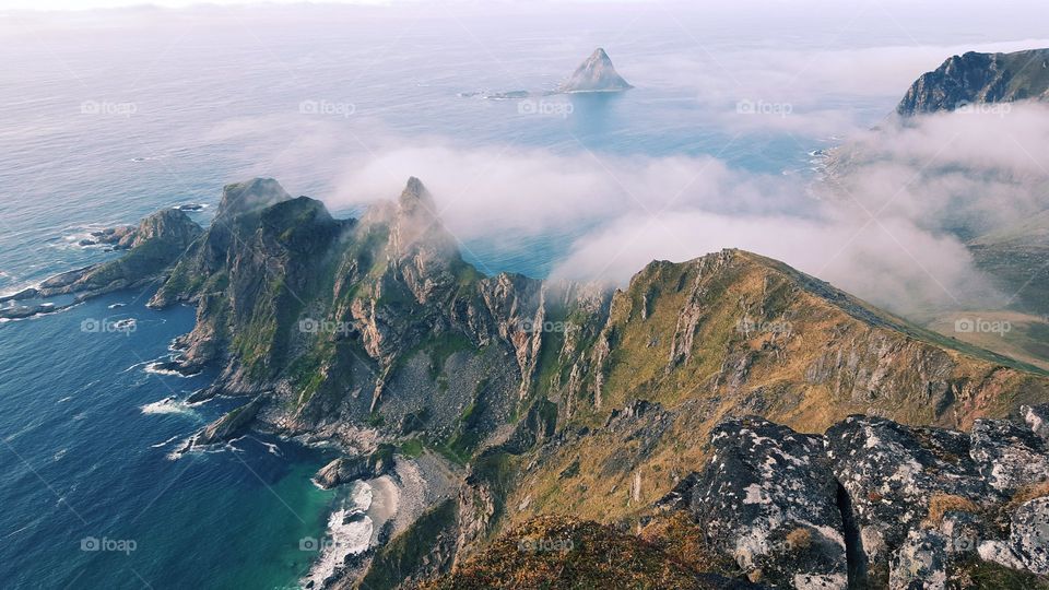 Clouds over the rocky mountain