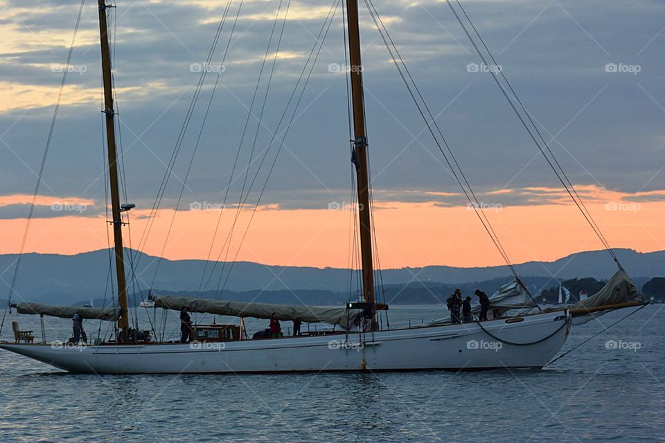 Sailing boat in sunset