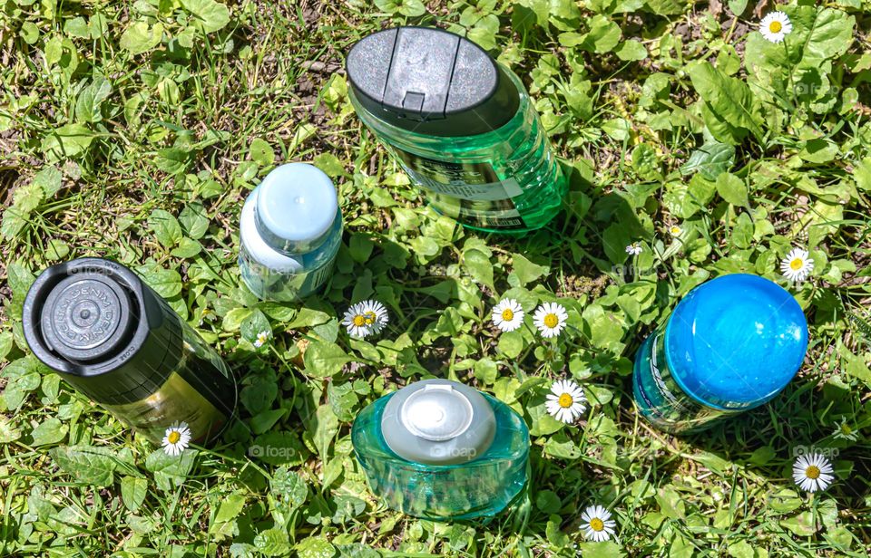 Beauty products on the meadow