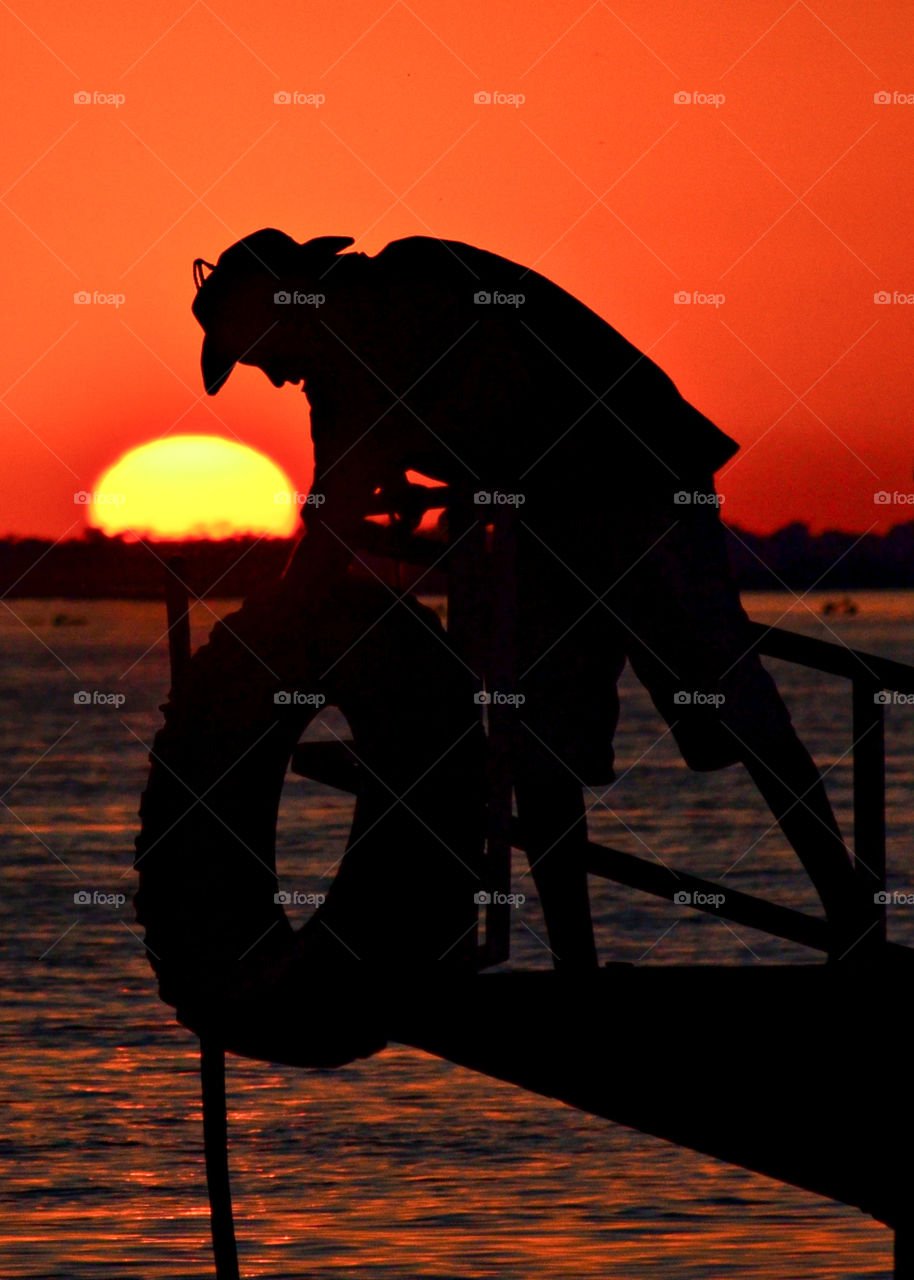 Pescador Pantaneiro chegando ao por do sol