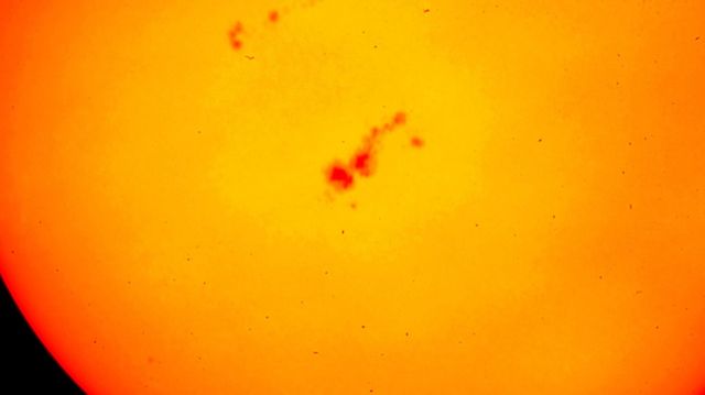 The sun and sunspots captured with camera Sony Nex coupled to telescope Sky-Watcher
