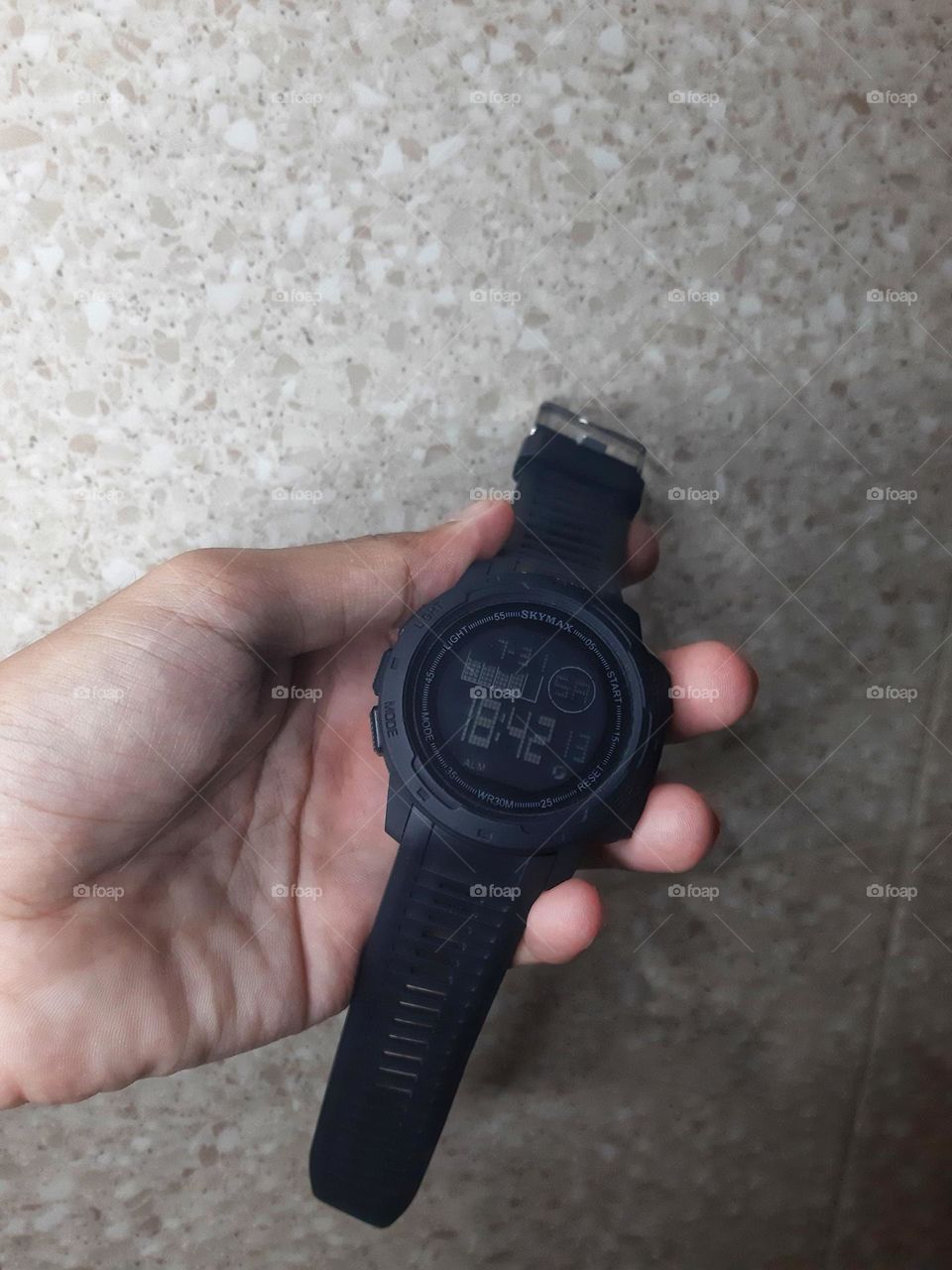 A black wrist watch aa perfect stuff for men's fashion