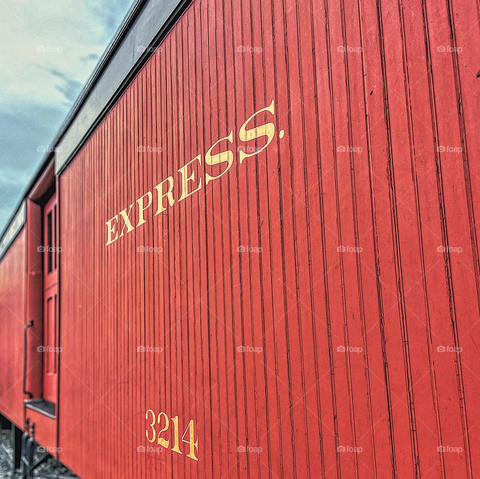 Red Express train car, trains in the Midwest, old fashioned trains, riding the rails, red train passenger cars 