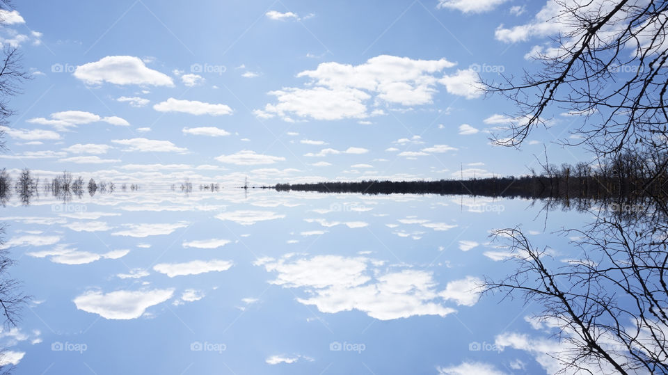 Reflection of sky and clouds in lake