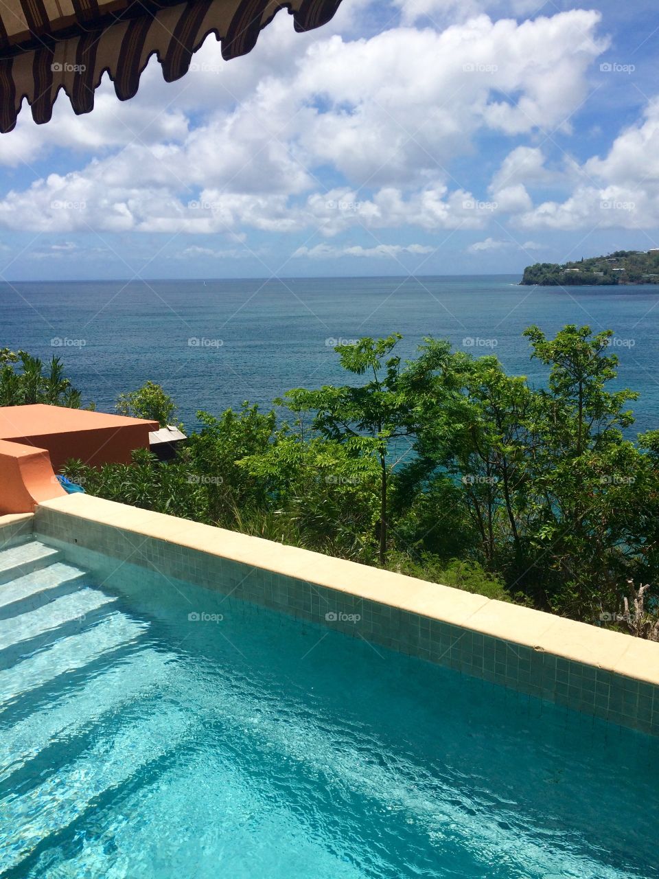 The amazing view from the edge of the private infinity pool of our suite at the Sandals Resort overlooking the stunning ocean water in St. Lucia. 