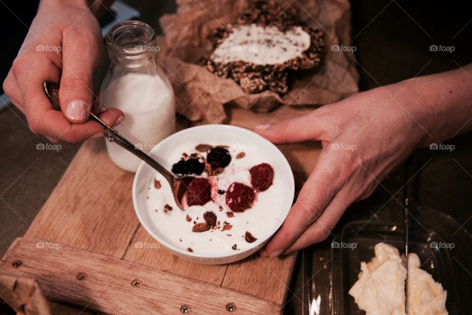 Close-up of a person preparing breakfast