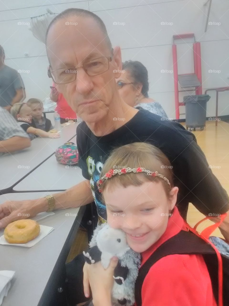 grandparents day at my daughter's school. she loves being with her Grandpa and her Grandpa loves spending time with her.
