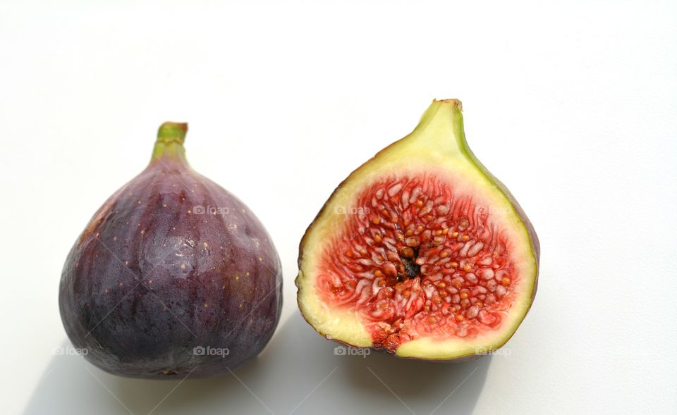 fresh figs fruits white background