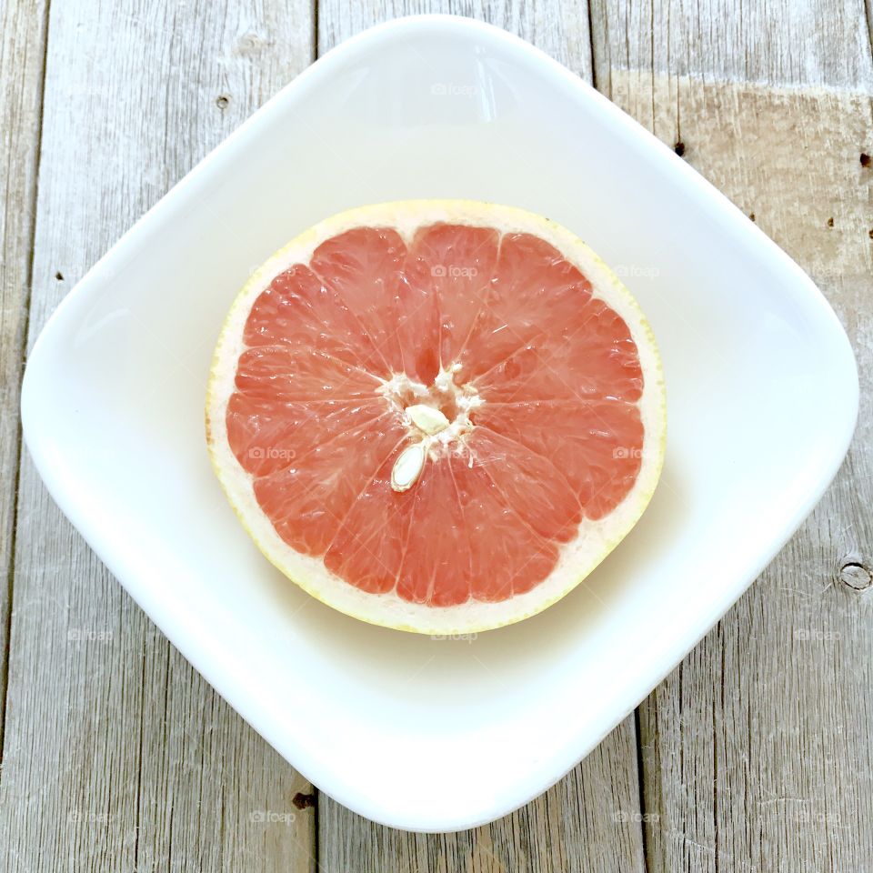 Half Grapefruit in Bowl