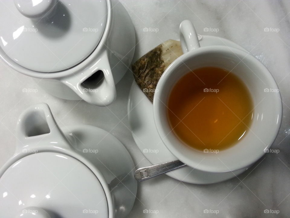 breakfast cups of tea on the table at the bar