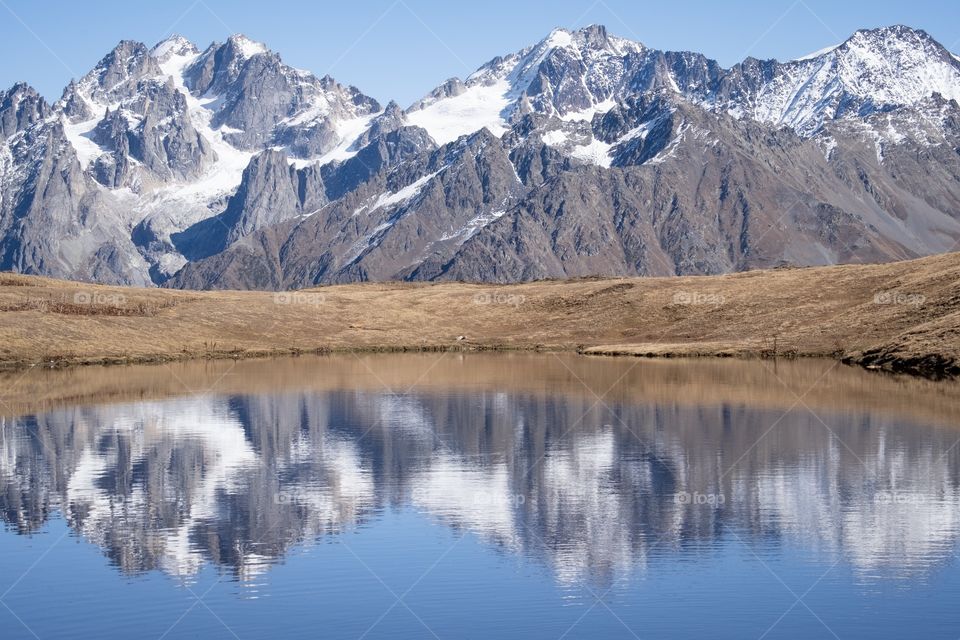 Beautiful reflection in Koruldi lake at the foot of Caucasus mountain , Georgia new landmark for tourists 