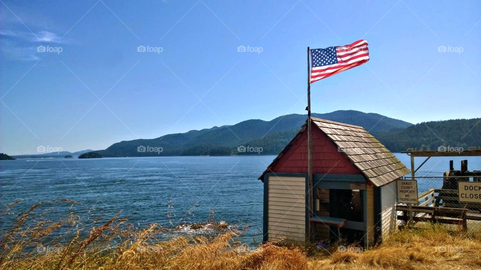 Sinclair Island, WA old post office and American Flag