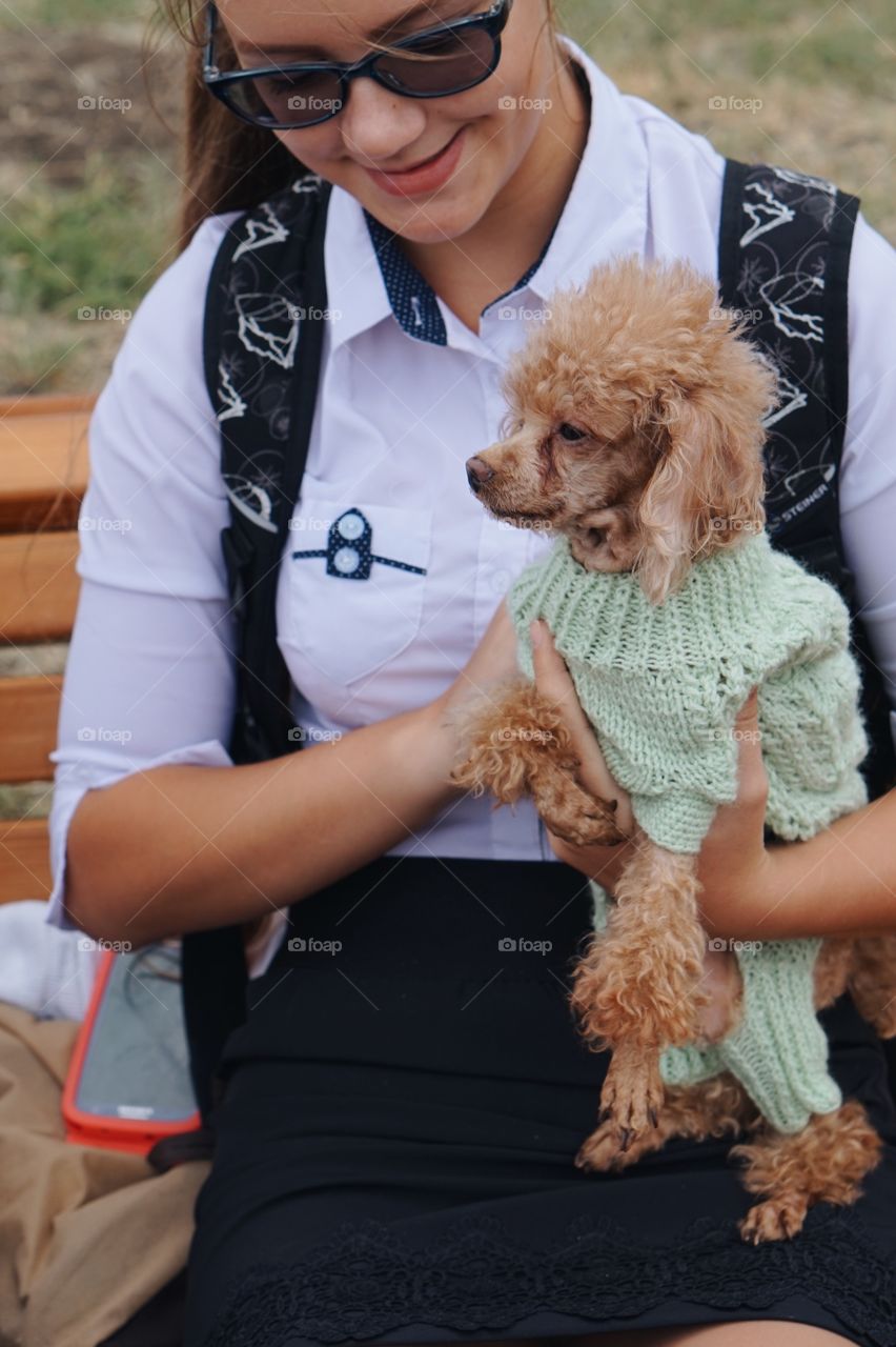 The girl with her pet 