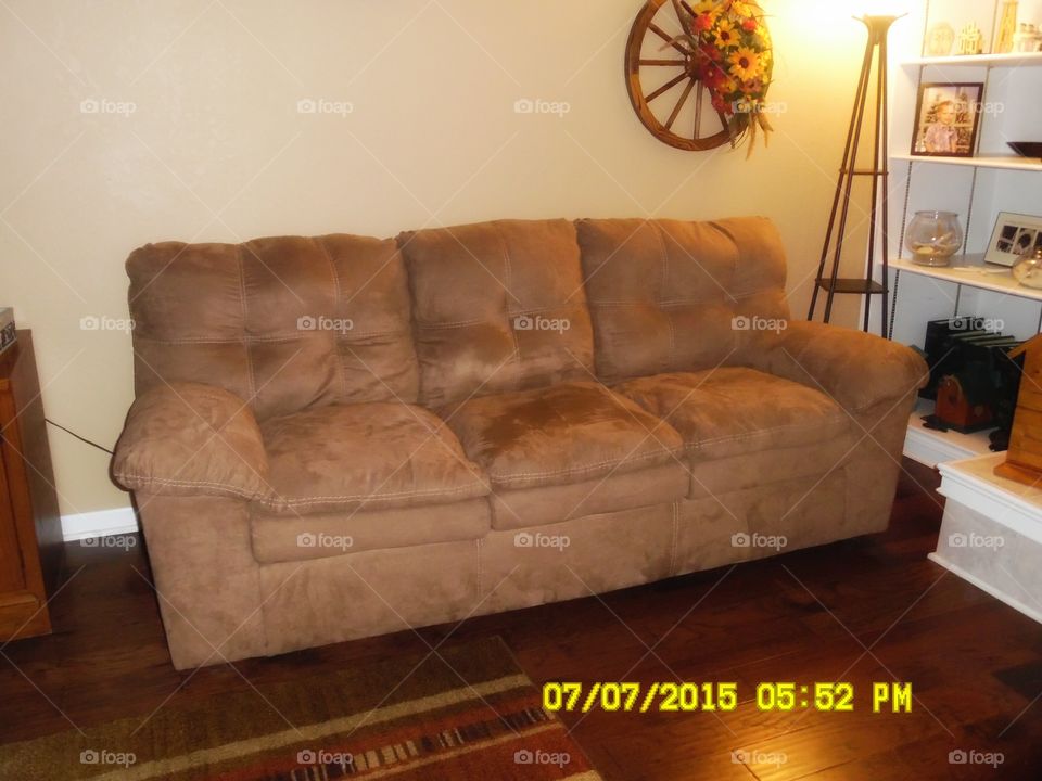 mom's couch for sale. I have been trying to sale my mother's couch for her by showing this picture around