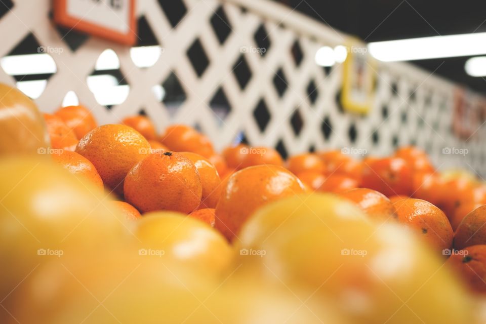Florida orange grove farmers market. A big pile of fresh oranges in a farmers market