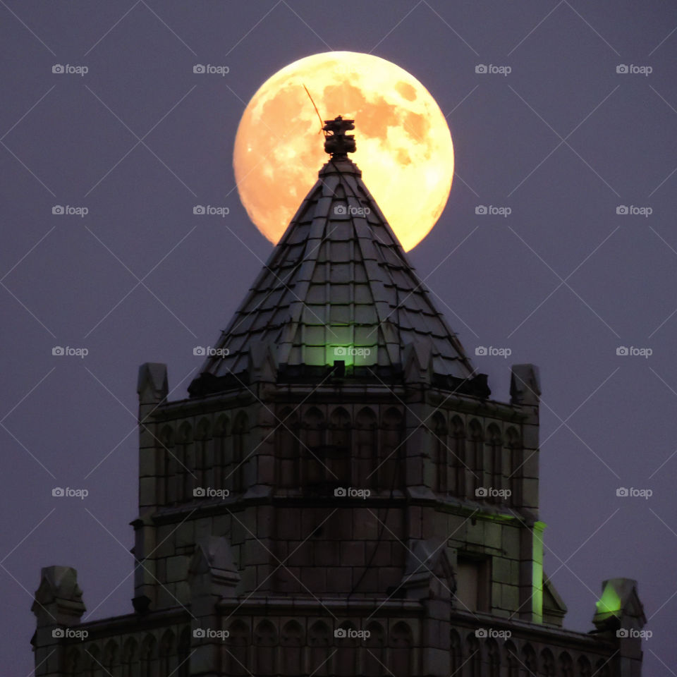 Ancient church and moon at night
