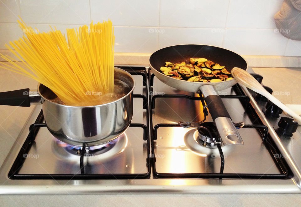 Preparing dinner with pasta and vegetables