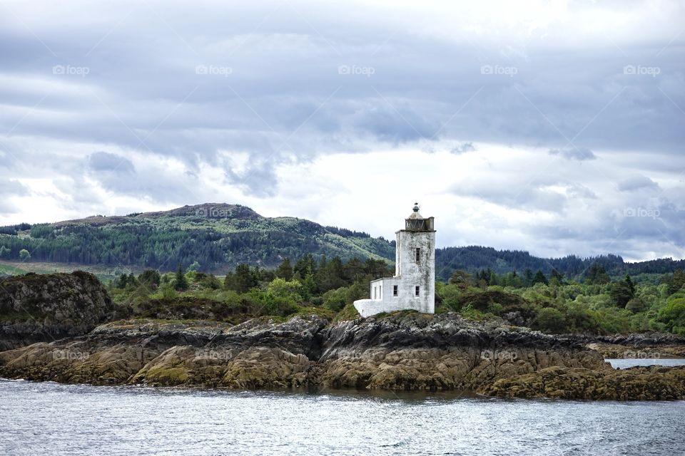 Lighthouse in Plockton Shore, Scotland.